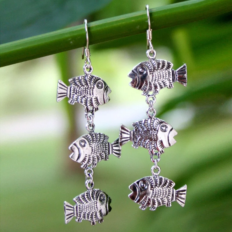- ​​Pet toys under    yuanThai Fish Sterling Silver Earrings