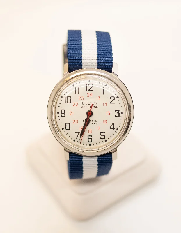 - Parrot climbing and standing wooden frame1976's Bulova Accutron
